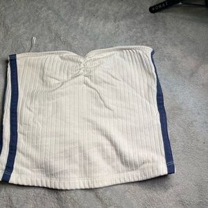 Cute white crop top with blue on the sides!